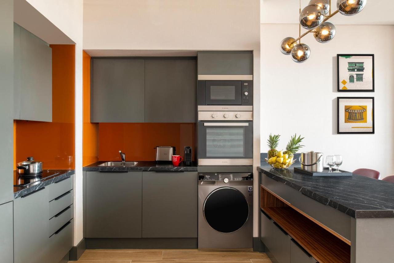 Swissotel Living Dschidda Exterior foto A typical kitchen in a serviced apartment